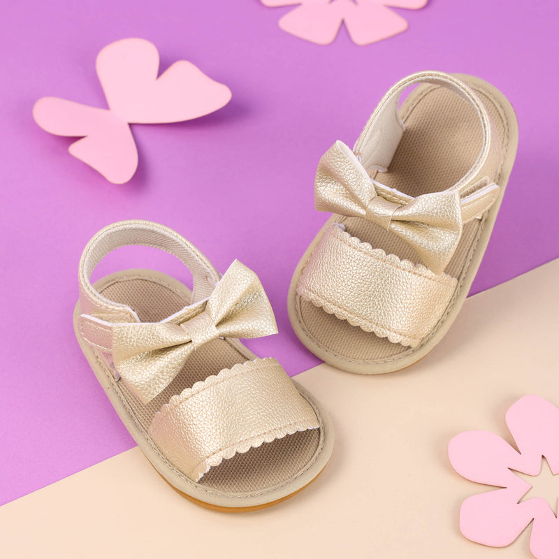 Twisted Bow Golden Sandals