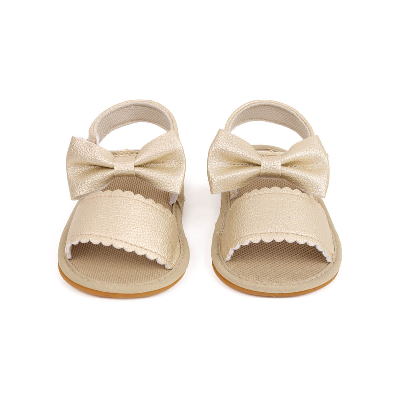 Twisted Bow Golden Sandals