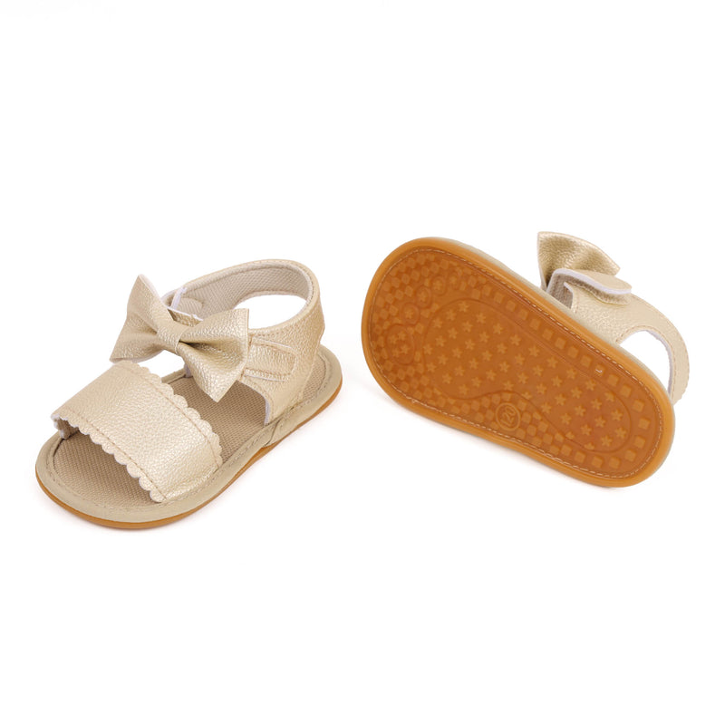 Twisted Bow Golden Sandals
